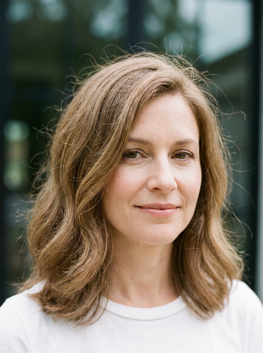 Seitenscheitel mit Soft Waves als Frisuren für dünne Haare Inspiration 2026